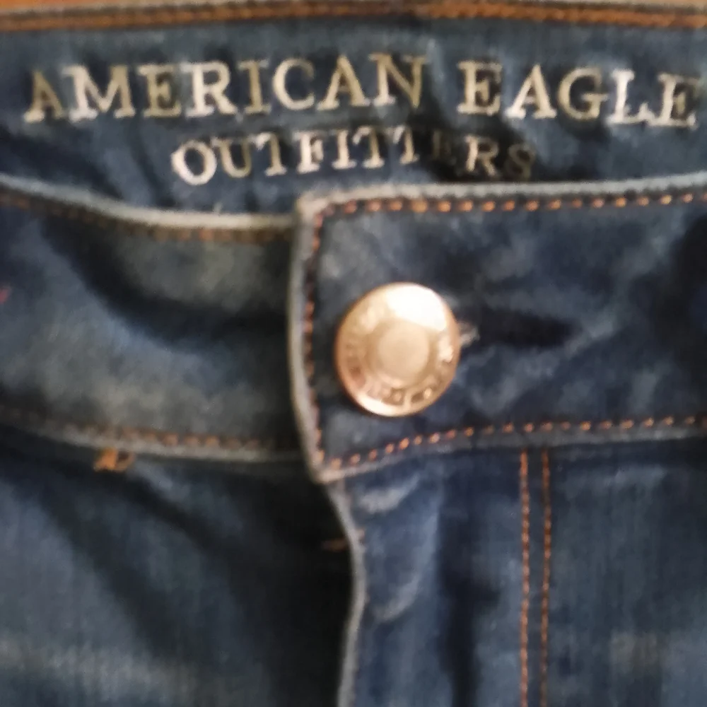 American Eagle Outfitters Distressed Denim Jeans Super Stretch High Rise Jegging
